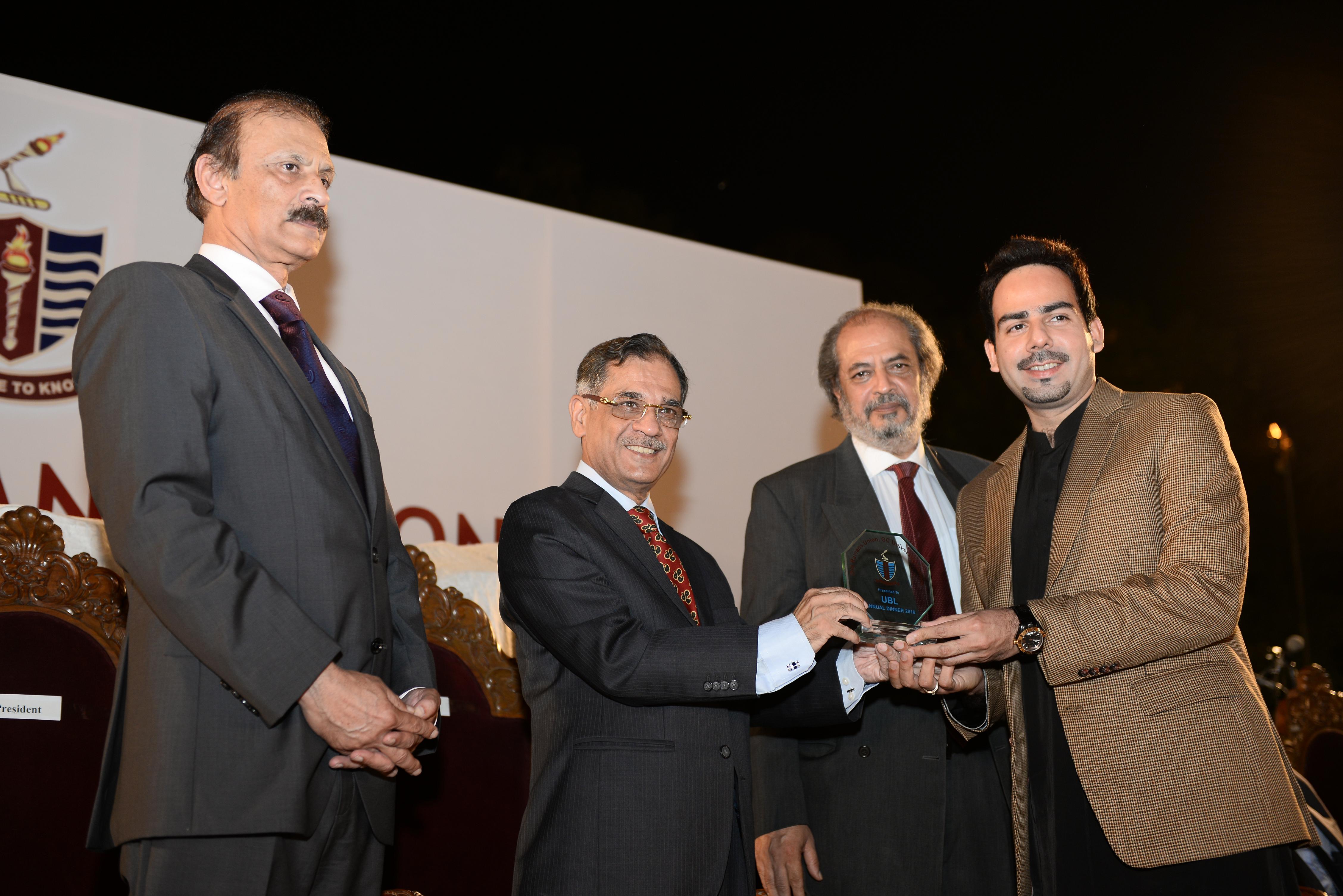 shield received by representative of UBL